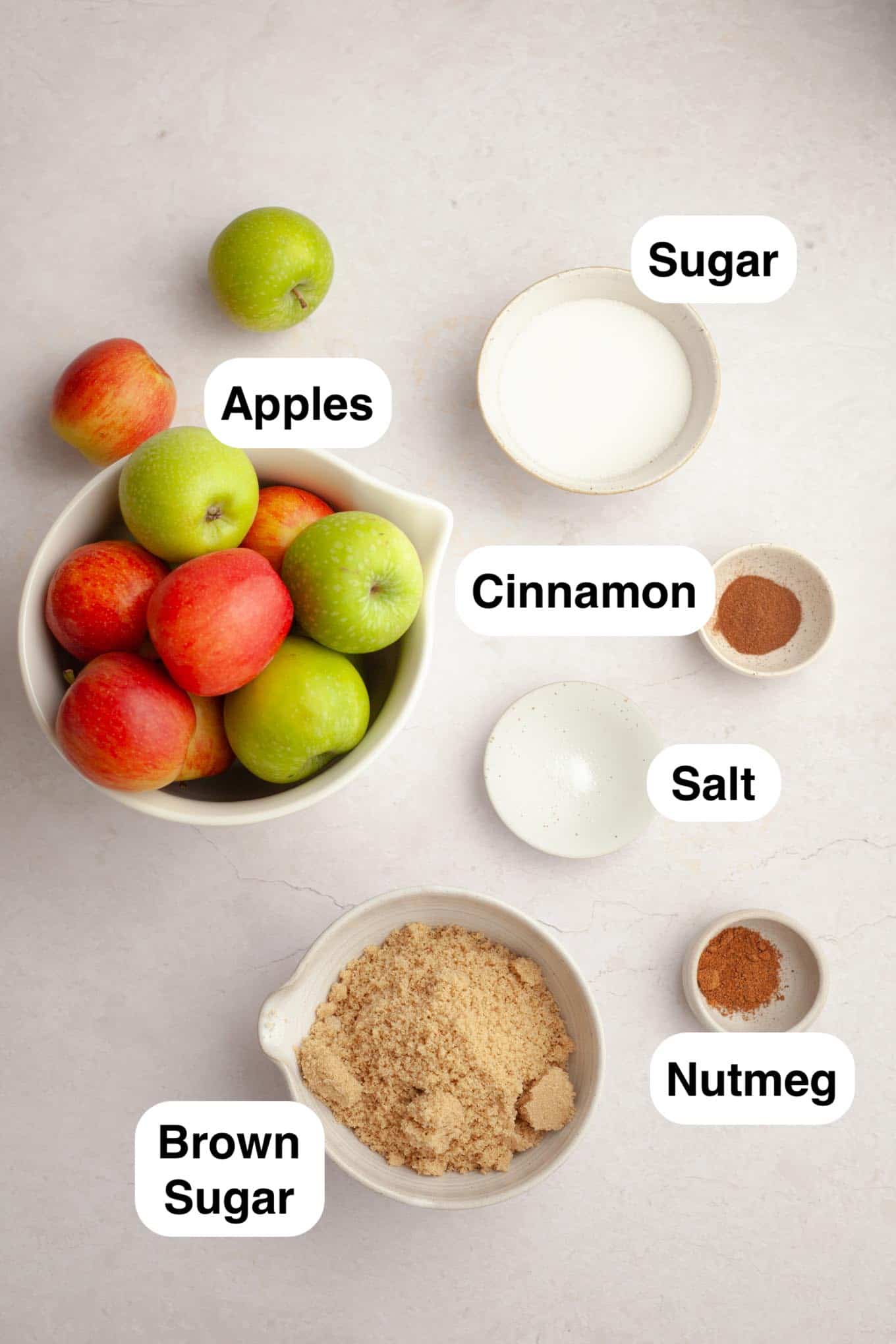 An overhead view of the ingredients needed for slow cooker apple butter. 