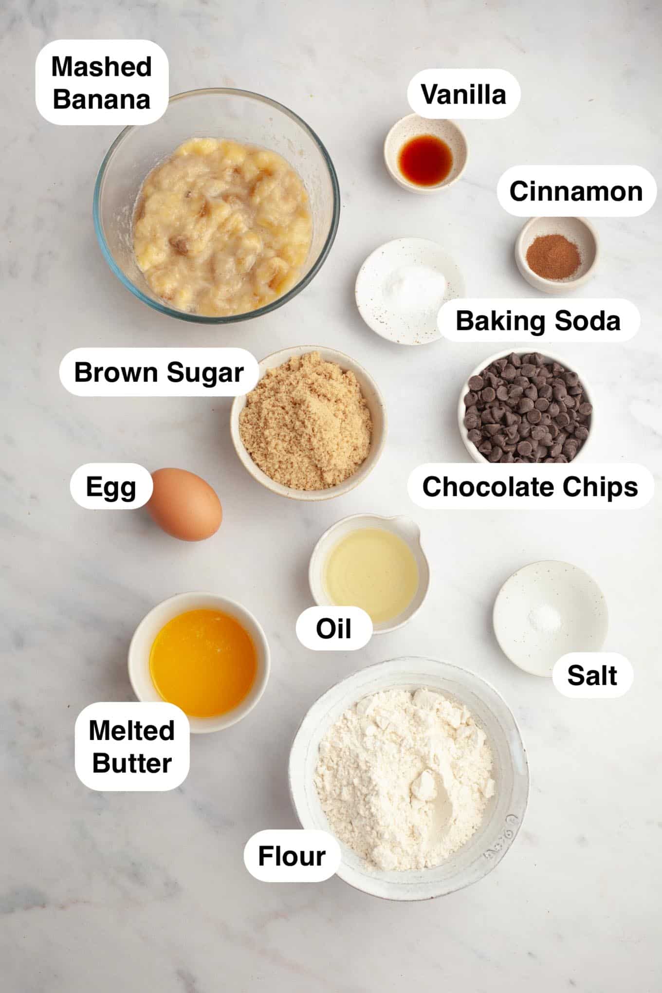 An overhead view of the ingredients needed for banana and chocolate chip muffins. 