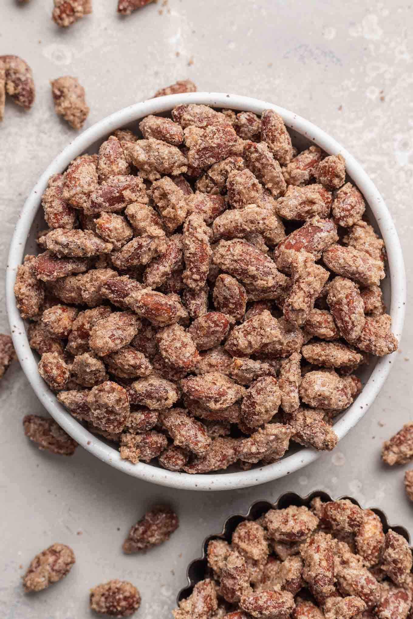 An overhead view of a bowl of candied almonds.