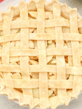 Learn how to make a lattice pie crust with this easy step-by-step tutorial. This simple technique is a beautiful decorative touch for almost any pie!