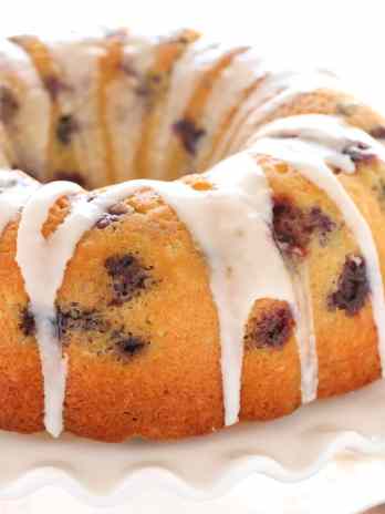 A moist lemon bundt cake filled with fresh blueberries and topped with a sweet lemon glaze. This Lemon Blueberry Bundt Cake is a perfect dessert for lemon lovers!