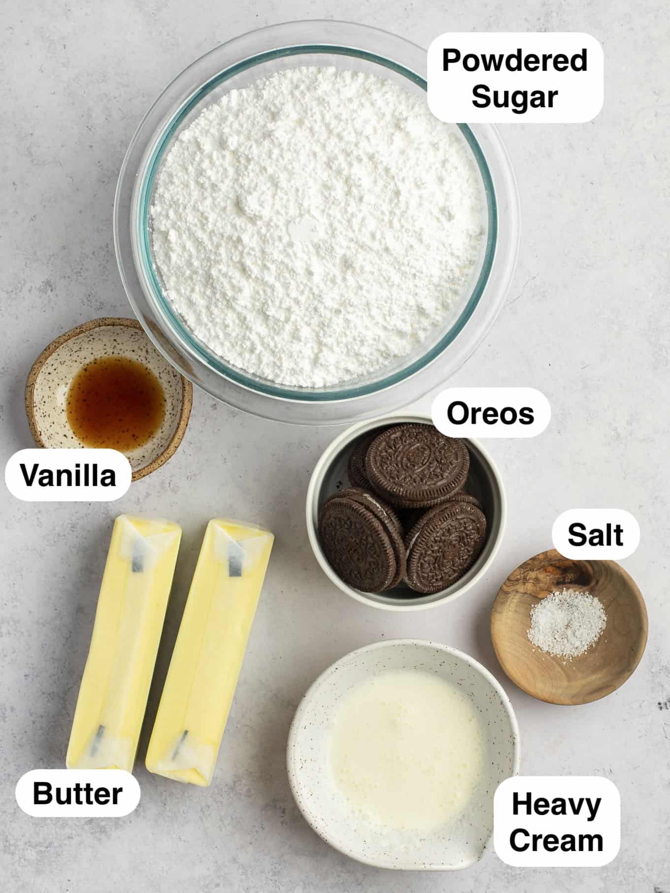 An overhead view of the ingredients needed for Oreo buttercream frosting. 