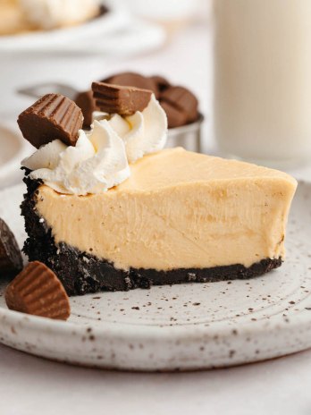 A slice of peanut butter pie on a white plate.
