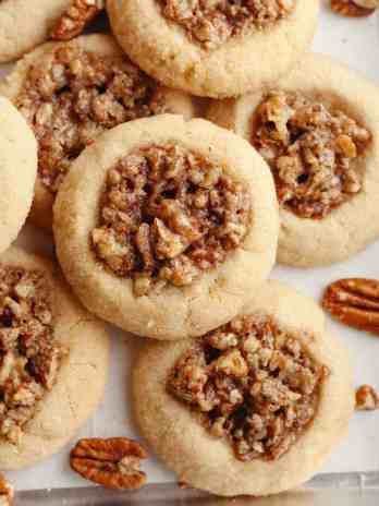 Several pecan pie cookies stacked on top of each other.