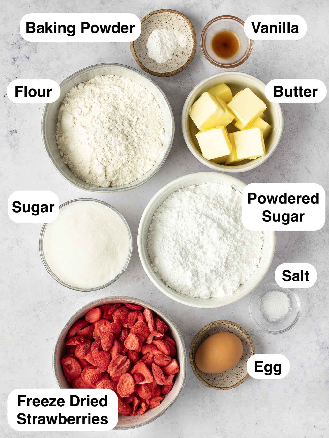 An overhead view of the ingredients needed to make strawberry cookies. 